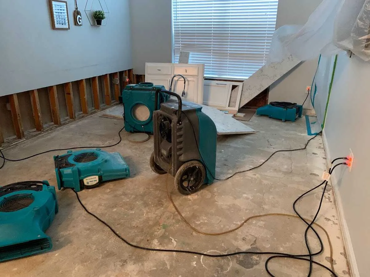 Dehumidifier in flood-cut room for Water Damage Restoration in Victoria